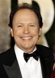En esta foto del 27 de febrero del 2011, el actor Billy Crystal llega a la fiesta del Oscar de Vanity Fair en Los Angeles, California. (Foto AP/Carlo Allegri, Archivo) 